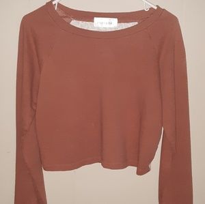 Everyday brand shirt fits like a med. Crop top